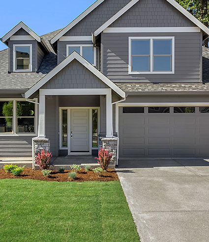 Residential garage door repair service by Doberman Garage Doors